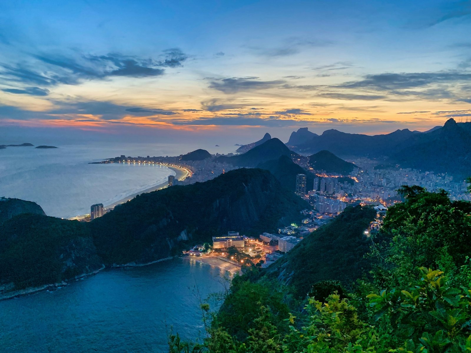 Copacabana Beach lit up at sunset, viewed from Sugarloaf Mountain, Rio de Janeiro